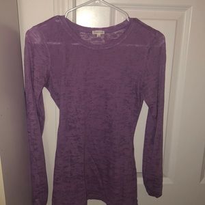 A purple sheer top